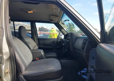 2000 Jeep Cherokee Sport z USA, uszkodzony, nr VIN 1J4FT48S8YL243753